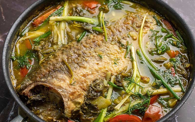 Món cá chép om dưa thơm ngon, nóng hổi, đậm đà hương vị