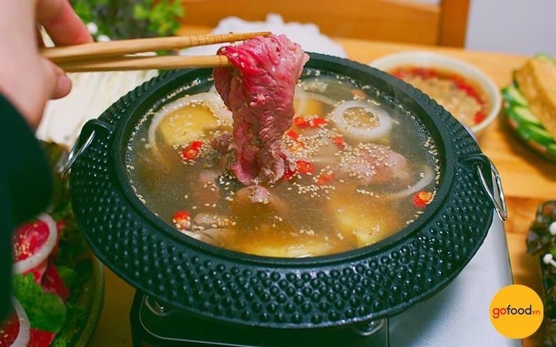 Lẩu bò nhúng giấm chua thanh, dễ ăn, là một trong những cách nấu lẩu ngon nhất