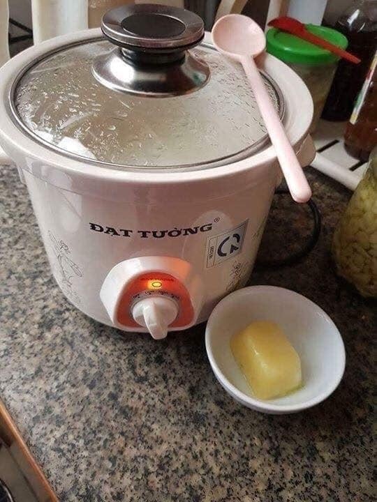 Hướng dẫn cách vệ sinh lòng nồi đất nung của nồi nấu cháo chậm Đạt Tường đúng cách