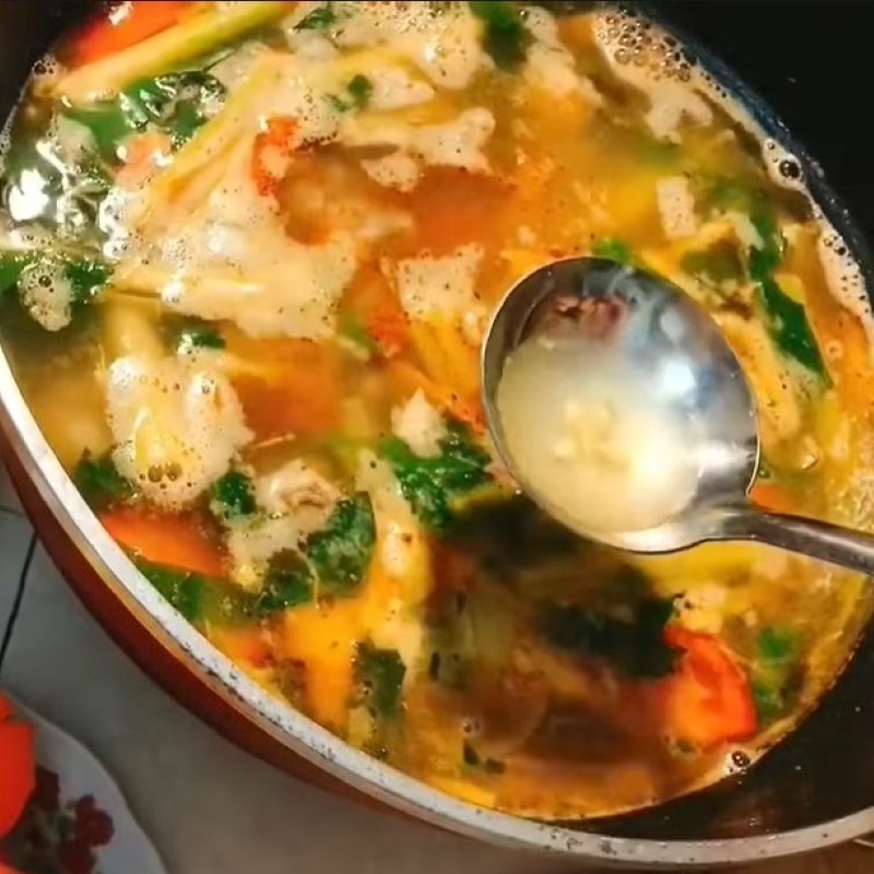 Nấu nước dùng lẩu ếch măng cay