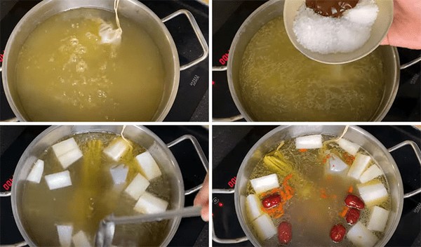 Nồi nước lẩu đuôi bò chua cay đang sôi sùng sục, hương thơm ngào ngạt