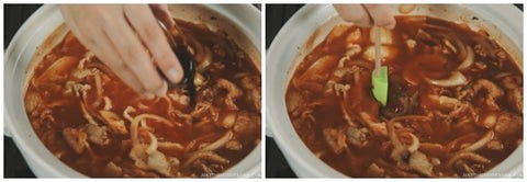 Nồi lẩu kim chi đang sôi sục với thịt ba chỉ và kim chi hấp dẫn