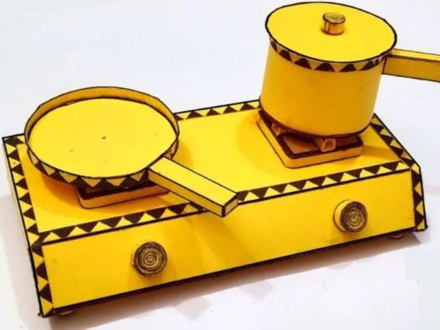 Bếp ga đồ chơi tự làm từ bìa carton và nắp chai, minh họa cách làm đồ chơi nấu ăn bằng giấy sáng tạo cho bé.